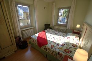 Postel nebo postele na pokoji v ubytování Casa Brina Suites
