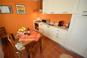 Kuchyň nebo kuchyňský kout v ubytování Casa Brina Suites