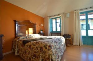 Postel nebo postele na pokoji v ubytování Casa Brina Suites