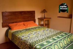 מיטה או מיטות בחדר ב-Kame House hostel