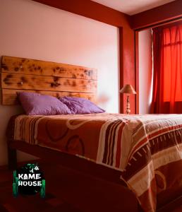 מיטה או מיטות בחדר ב-Kame House hostel
