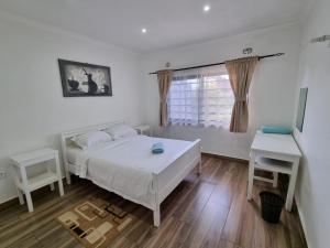 Gallery image of Mwaiseni Maisonettes apartments in Ndola