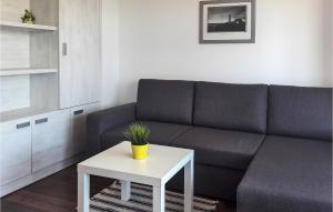 Posezení v ubytování Two-Bedroom Holiday Home In Banjole