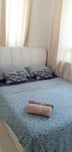 Кровать или кровати в номере Leezahomestay