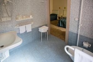Koupelna v ubytování Hotel le Muse