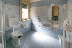 Koupelna v ubytování Hotel le Muse