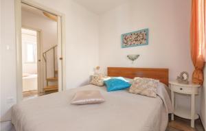 Ένα ή περισσότερα κρεβάτια σε δωμάτιο στο Holiday Home Kraj V