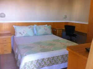 Ein Bett oder Betten in einem Zimmer der Unterkunft Crystal Place
