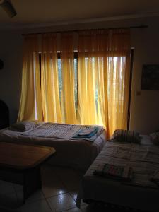 Een bed of bedden in een kamer bij Apartments Vanda