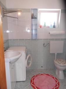 Een badkamer bij Apartments Vanda