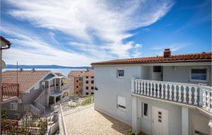 a view from the balcony of a building at Amazing Apartment In Crikvenica With Kitchenette in Crikvenica