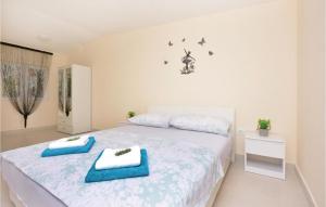 Posteľ alebo postele v izbe v ubytovaní Four-Bedroom Holiday Home In Lecevica