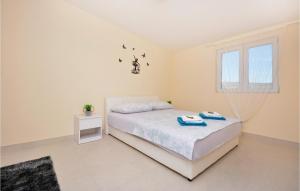 Posteľ alebo postele v izbe v ubytovaní Four-Bedroom Holiday Home In Lecevica