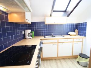 Cuina o zona de cuina de Cozy Apartment in Niedernsill with Garden