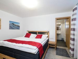 מיטה או מיטות בחדר ב-Apartment in ski area in Leogang with sauna