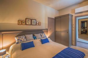 Postel nebo postele na pokoji v ubytování Heraclea Residential Apartments
