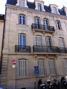 a large building with balconies on the side of it at Apartment Bonnard - best view in Dijon in Dijon