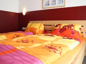 A bed or beds in a room at Chalet in Piesendorf near Ski Slopes