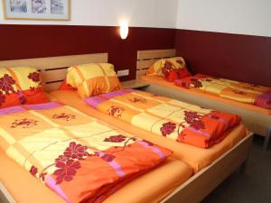 A bed or beds in a room at Chalet in Piesendorf near Ski Slopes