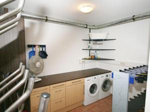 A kitchen or kitchenette at Chalet in Piesendorf near Ski Slopes