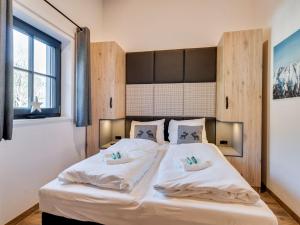 Posteľ alebo postele v izbe v ubytovaní Chalet in Krimml near Zillertal Ski Arena