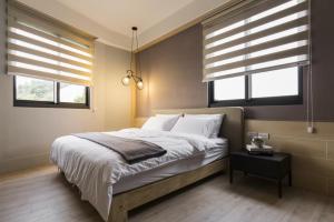 Letto o letti in una camera di 風起文旅 The Wind Rises