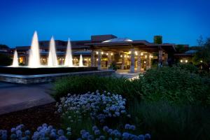 a fountain in front of a building at night at Grand Geneva Resort and Spa in Lake Geneva
