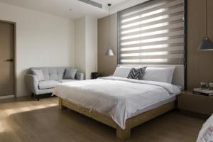 Letto o letti in una camera di 風起文旅 The Wind Rises