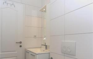 Koupelna v ubytování Apartmani Keran