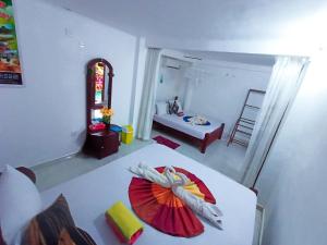 Letto o letti in una camera di Sigiri Tarushan Home Stay