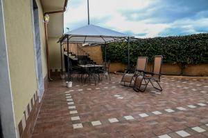 Patio alebo iná vonkajšia časť ubytovania Etna Dimora dei Saponari