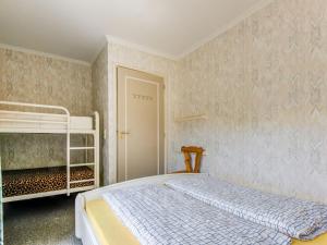 Letto o letti in una camera di Comfortable apartment in Ellmau with balconies
