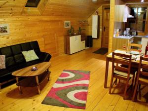 Posezení v ubytování Apartment in a wooden chalet in Liebenfels Carinthia near the ski area