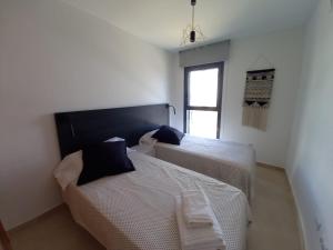 Posteľ alebo postele v izbe v ubytovaní Residencial Dulcinea - Chalet