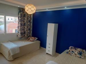Tempat tidur dalam kamar di new marina heart of Hurghada