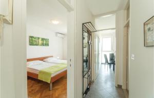 Posteľ alebo postele v izbe v ubytovaní One-Bedroom Apartment in Zadar