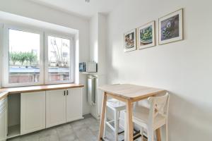 Kuchyňa alebo kuchynka v ubytovaní LTC - Apartments Piłsudskiego przy Bulwarze