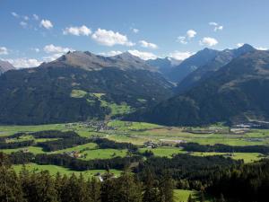 a view of a valley in the mountains at Cozy Apartment with Sauna near Ski Slopes in Mittersill in Hollersbach im Pinzgau