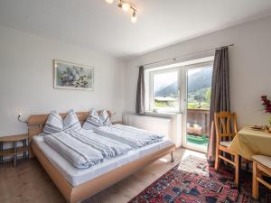 Voodi või voodid majutusasutuse Modern Apartment near Ski Area in M hlbach toas