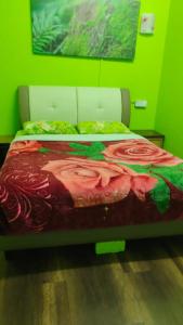 Postel nebo postele na pokoji v ubytování Rose Haven Hotel