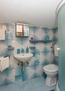 Kúpeľňa v ubytovaní Apartment Tomisha