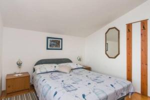 Posteľ alebo postele v izbe v ubytovaní Apartment Tomisha