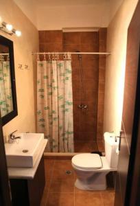 Kúpeľňa v ubytovaní Spilios Apartment + 11 fotografií