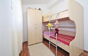 Postel nebo postele na pokoji v ubytování Holiday Home Drvenik Mali 07