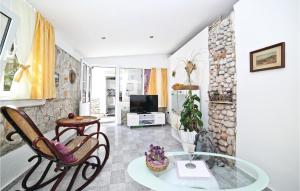 TV a/nebo společenská místnost v ubytování Holiday Home Drvenik Mali 07