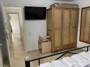 Telewizja i/lub zestaw kina domowego w obiekcie Villa Emilia 8 PAX