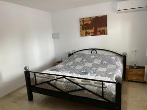Łóżko lub łóżka w pokoju w obiekcie Villa Emilia 8 PAX