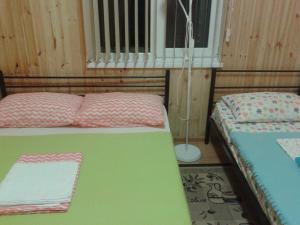 Cama o camas de una habitación en Гостевой Дом "У Моря"