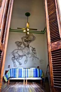 Postel nebo postele na pokoji v ubytování Art Factory San Telmo