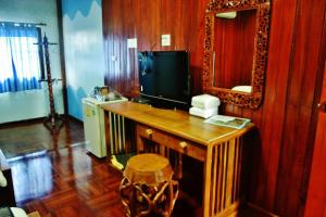 Телевизор и/или развлекательный центр в Suandarbporn Resort Mae Sot